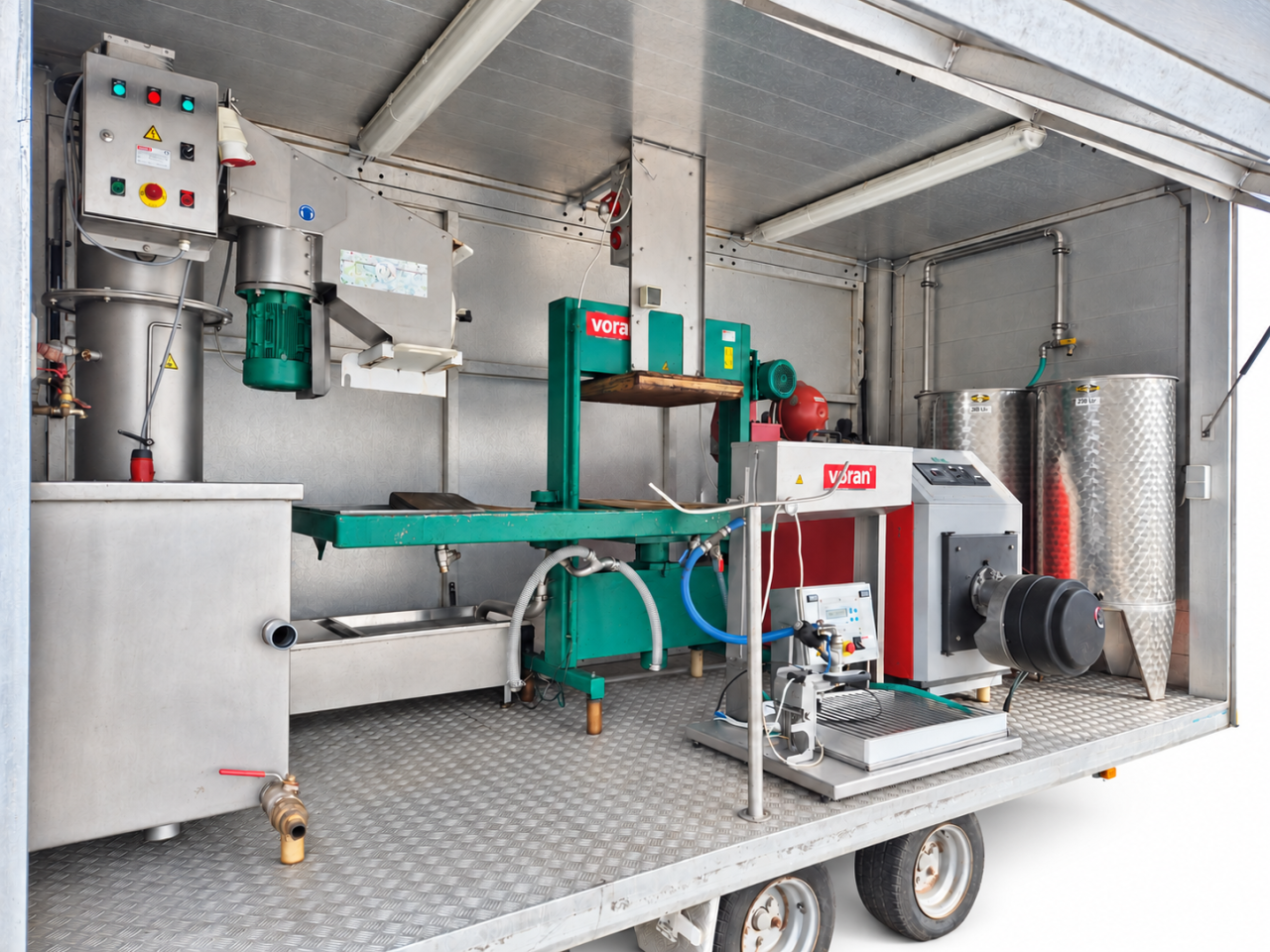 Complete juice pressing equipment inside the mobile trailer